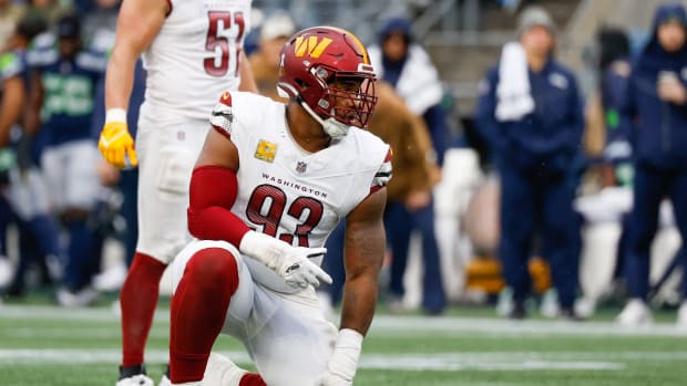 Washington Commanders defensive tackle Jonathan Allen (93) waits for a snap against the Seattle Seahawks during the second quarter at Lumen Field.